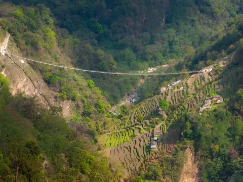 Suspension bridge in Jhinu Danda along the Annapurna Base Camp Trek in Nepal.