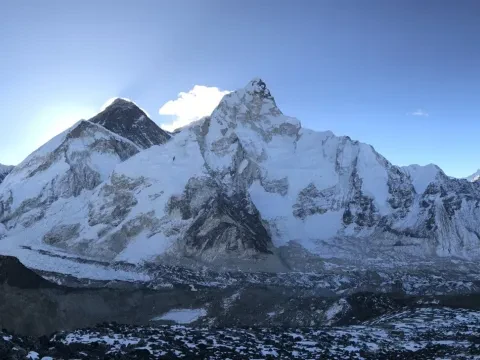 Panoramic Himalayan view from Kala Patthar summit with Mount Everest and surrounding peaks in Nepal.