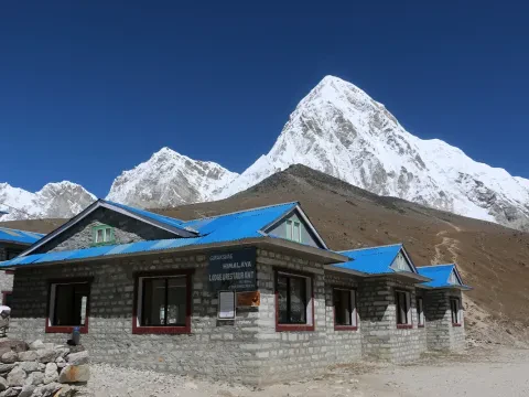 Gorak Shep lodge with Pumori and Himalayan mountain views on the Everest Base Camp Trek.