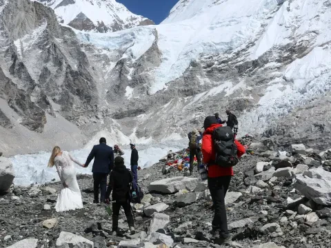 Trekkers at Everest Base Camp in the Khumbu Himalayas, Nepal .