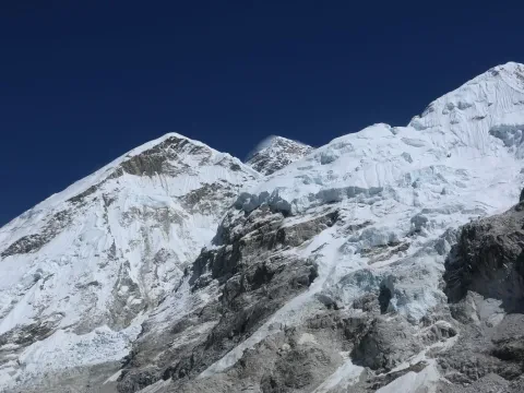 Everest Base Camp surrounded by Himalayan mountains in Nepal.