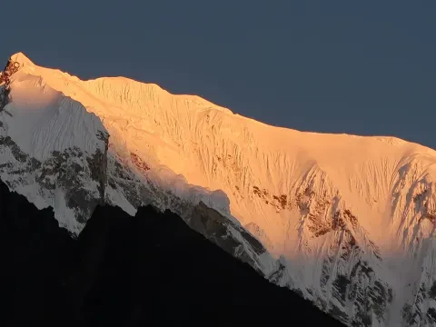 Golden sunrise over Langtang Lirung.