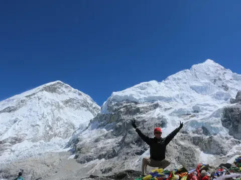 Everest Base Camp surrounded by dramatic Himalayan peaks in Nepal.