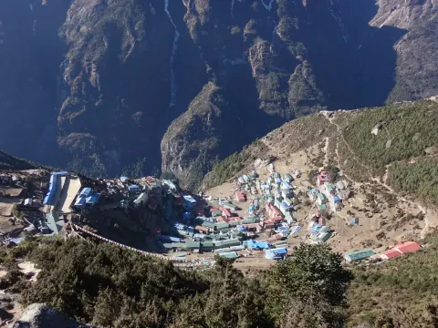Namche Bazaar village surrounded by Himalayan mountains, Everest region Nepal.