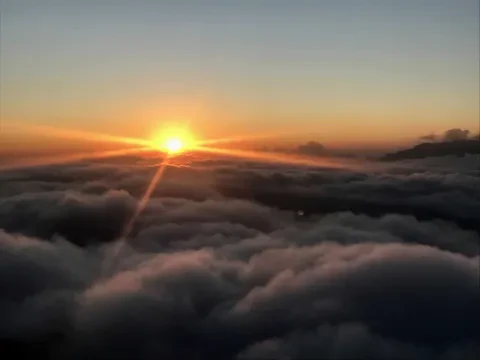 Golden sunset above the sea of clouds on the Mardi Himal Trek.