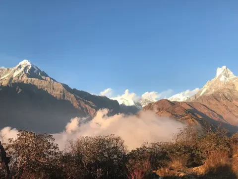 Dramatic clouds around the Himalayan peaks, Mardi Himal Trek.