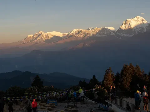 Golden sun rays illuminating Mount Dhaulagiri near Poon Hill, Nepal.