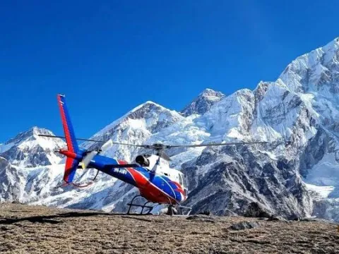 Helicopter landed at Kala Patthar with Mount Everest and Himalayan peaks