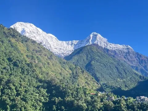 Jhinu Danda village with panoramic Himalayan mountain views.