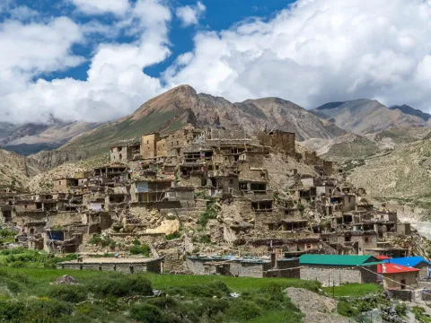 Nar Village surrounded by alpine landscape in Nar Phu Valley.