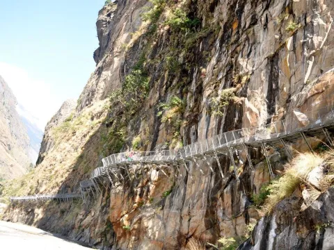 Manaslu cantilever bridge crossing a deep Himalayan gorge on the Manaslu Trek .