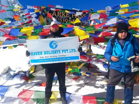 Trekker crossing Larke Pass on the Manaslu Circuit Trek organized by Haven Holidays Pvt. Ltd..