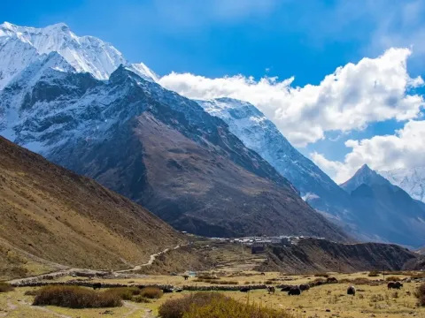 Alpine landscape with a mountain trail on the Manaslu Circuit Trek.