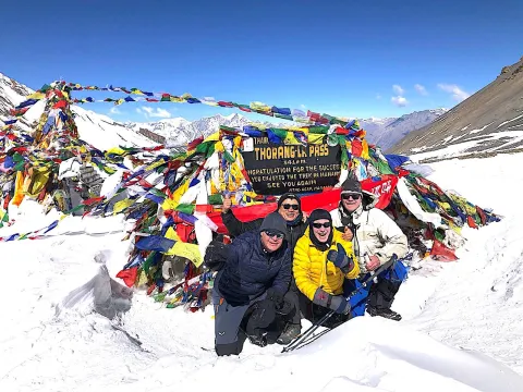 Thorong La Pass on the Annapurna Circuit Trek with dramatic Himalayan mountain scenery in Nepal.