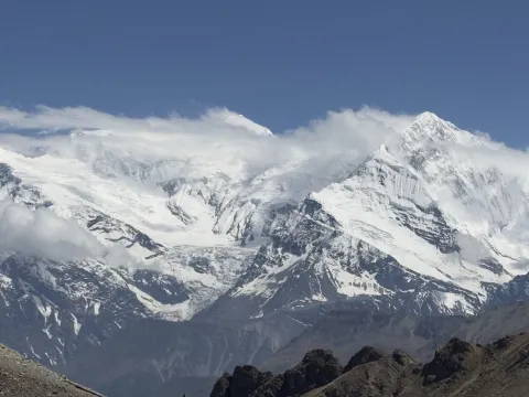 Panoramic Annapurna mountain range with snow-covered peaks in the Himalayas of Nepal.