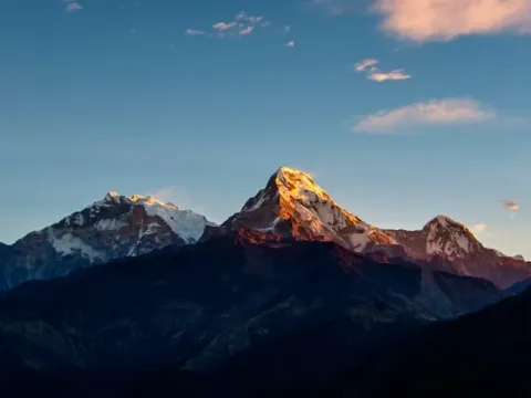 Golden sunrise over Annapurna South seen from Poon Hill in the Annapurna region of Nepal.