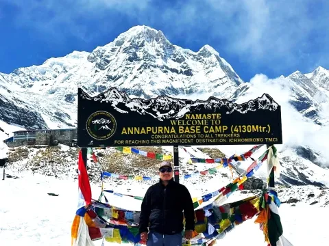 Annapurna Base Camp surrounded by towering Himalayan peaks in Nepal.