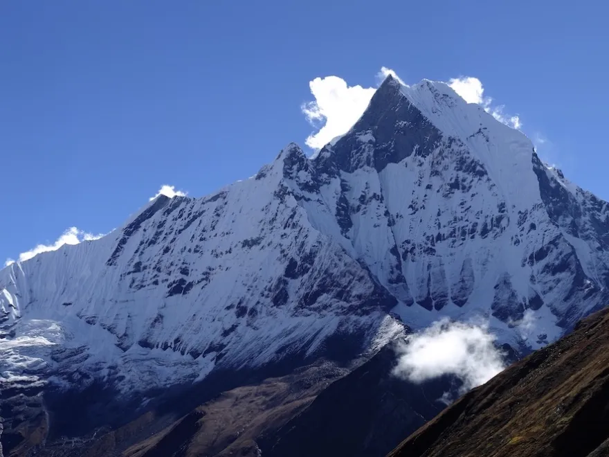 Mount Fishtail Machhapuchhre and surrounding Himalayan mountains viewed from Annapurna Base Camp in Nepal.