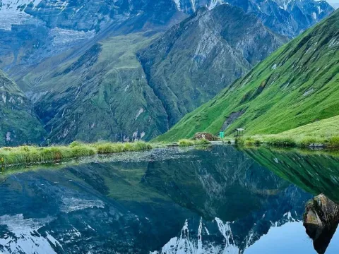 Mount Fishtail Machhapuchhre reflected in a calm lake in the Annapurna region of Nepal.