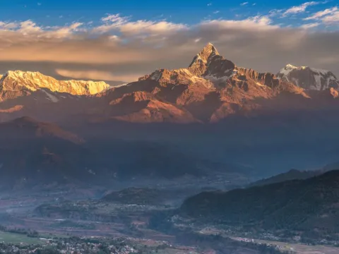 Sunrise over the Annapurna mountain range viewed from Sarangkot near Pokhara, Nepal.