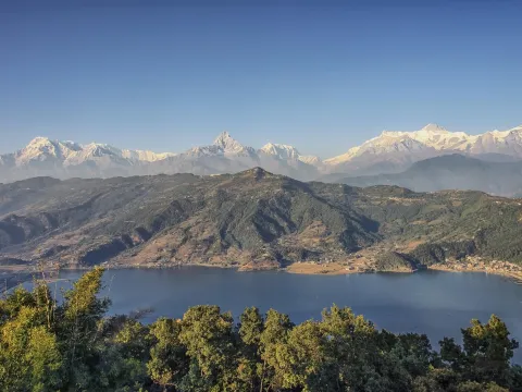 Phewa Lake in Pokhara with the Annapurna mountain range in the background, Nepal.