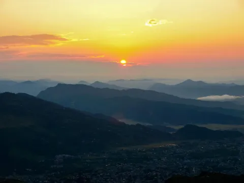 Golden sunrise over the Annapurna and Machhapuchhre mountains viewed from Sarangkot near Pokhara, Nepal.