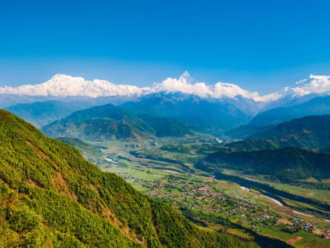 Panoramic view of Himalayan mountain ranges and Pokhara Valley from Sarangkot, Nepal.