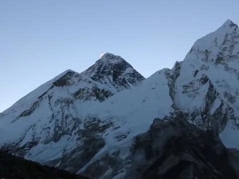 Mount Everest towering above the Himalayan landscape in Nepal.