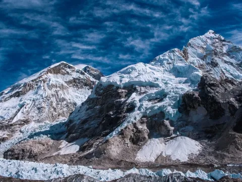 Everest Base Camp beside the Khumbu Glacier surrounded by towering Himalayan peaks in Nepal.