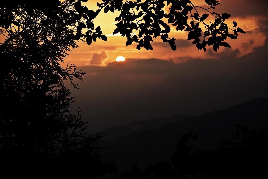 Phulchoki Hill sunrise with Himalayan views.