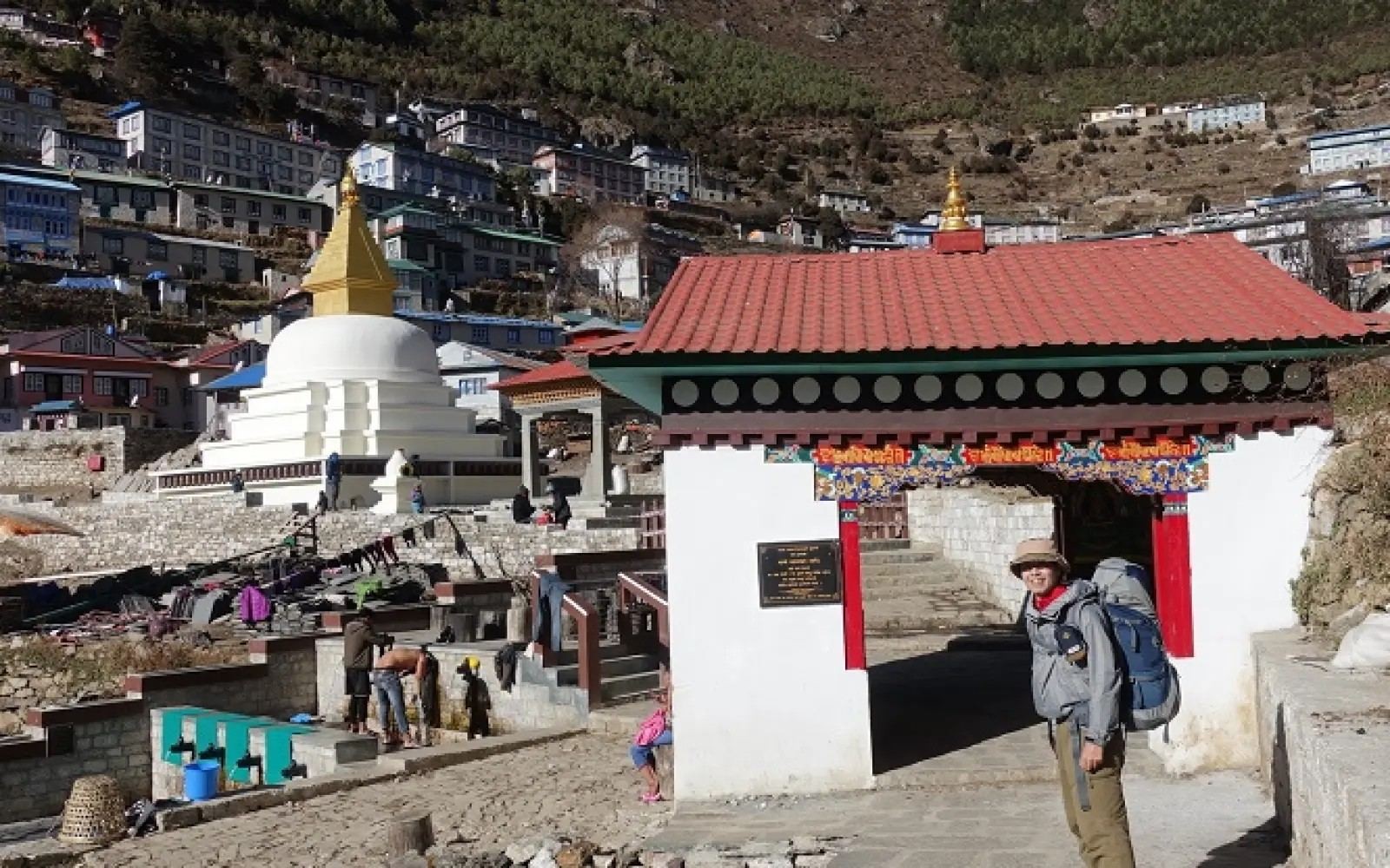 "Namche Bazaar village surrounded by Himalayan mountains on the Everest Base Camp Trek route in the Khumbu region of Nepal" 