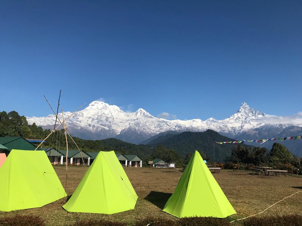 Australian Camp with panoramic views of the Annapurna and Machhapuchhre mountains on the way to the Mardi Himal Trek in Nepal.