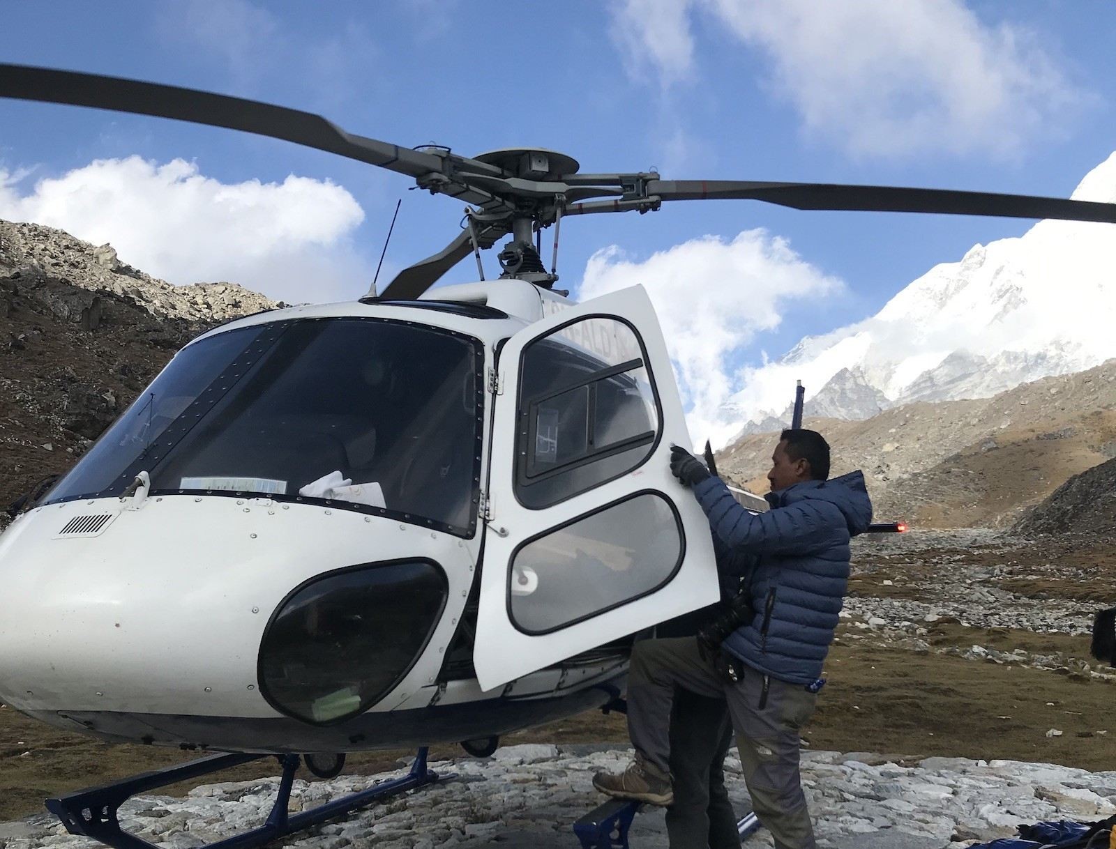 "A helicopter rescue in the Everest region provides rapid emergency evacuation for trekkers affected by altitude sickness, injury, or severe weather.