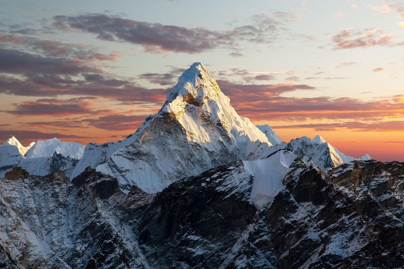 Sunset view of Ama Dablam from Kala Patthar, with golden light illuminating the snow-covered Himalayan peak under crystal-clear November skies.