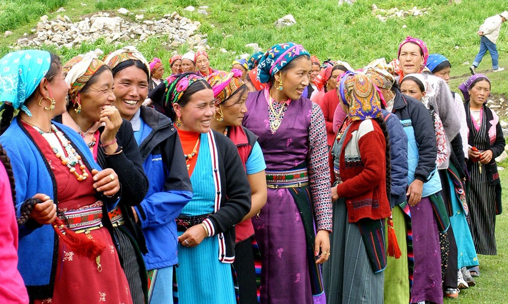 Tamang people in traditional attire showcasing their rich cultural customs and heritage in Langtang Valley, Nepal.