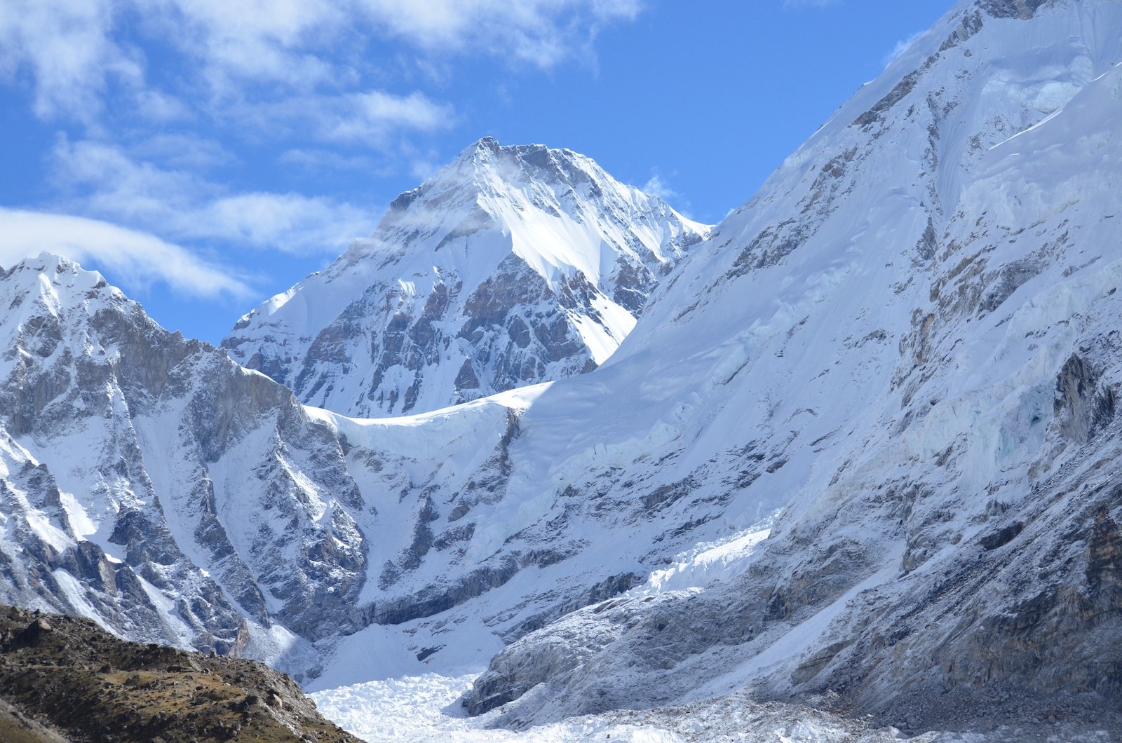 Khumbu Glacier and Khumbu Icefall at Everest Base Camp with towering ice seracs, deep crevasses, rugged glacial moraine, and magnificent views of Mount Everest, Nuptse, and the surrounding Himalayan peaks.