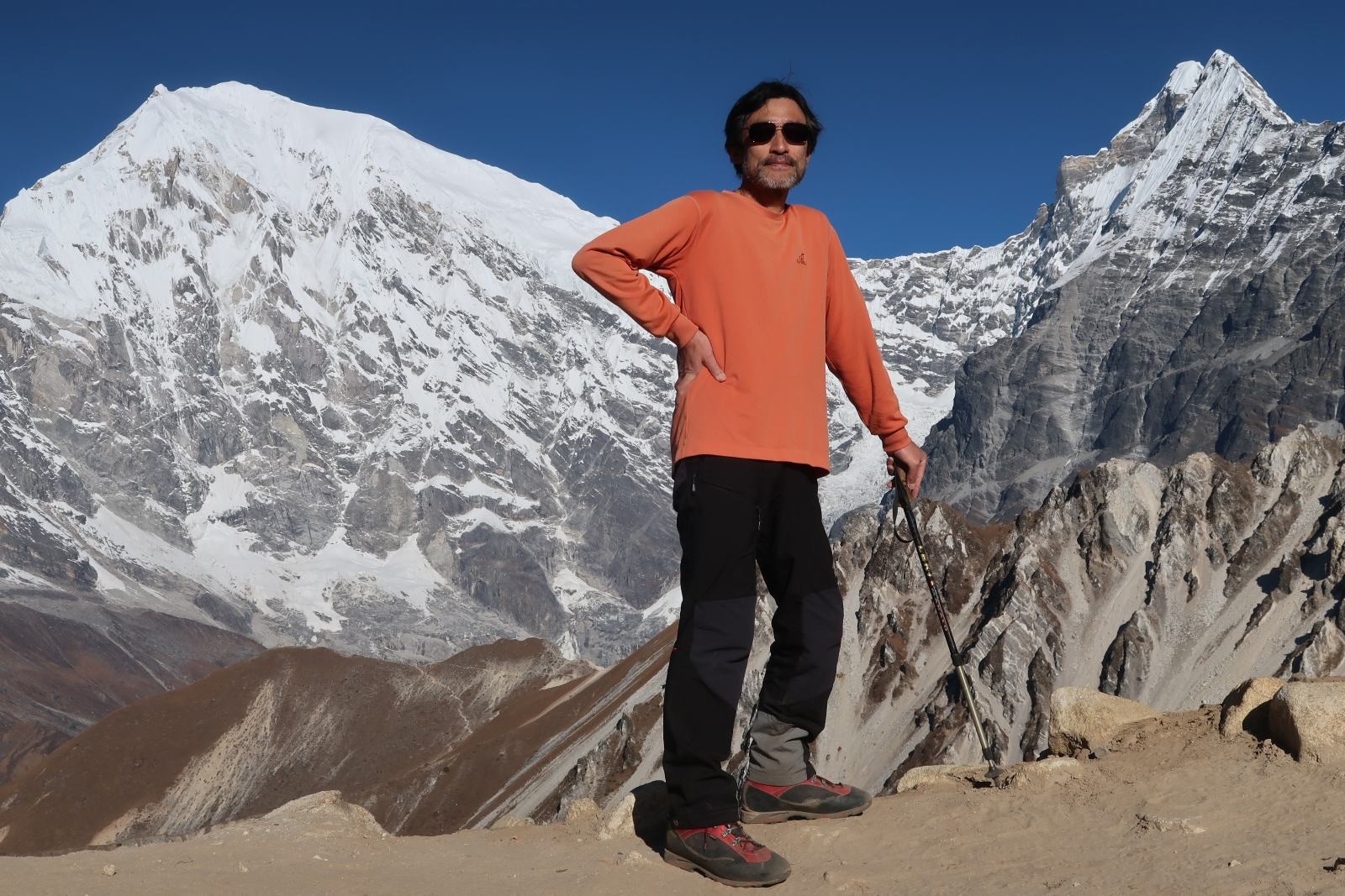 Trekker with Langtang Lirung mountain in background Langtang Valley Nepal Himalaya