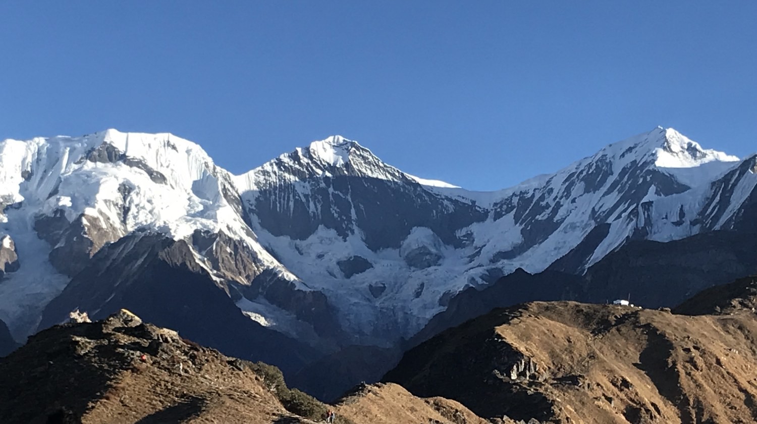 Gangapurna, Annapurna III, and the ridge trail viewed from the Mardi Himal Trek in the Annapurna region of Nepal.
