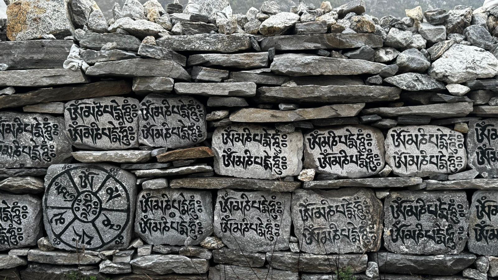 memorials with Tibetan Manatras on Langtang Valley Trekking Trail