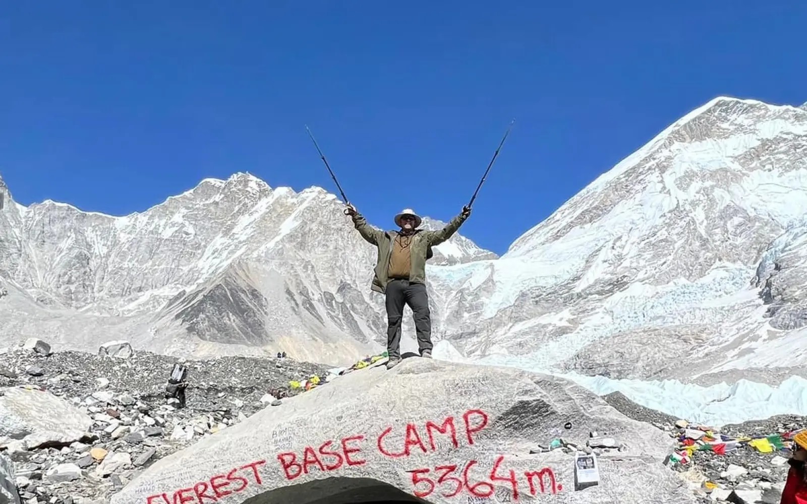 Mount Everest and surrounding Himalayan peaks rising above the rugged landscape of Sagarmatha National Park in Nepal.