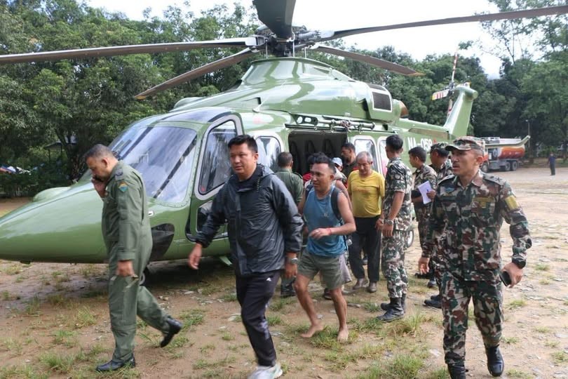 Helicopter supporting rescue operations after the August 26, 2026 Rasuwa flood, assisting affected communities and emergency response teams