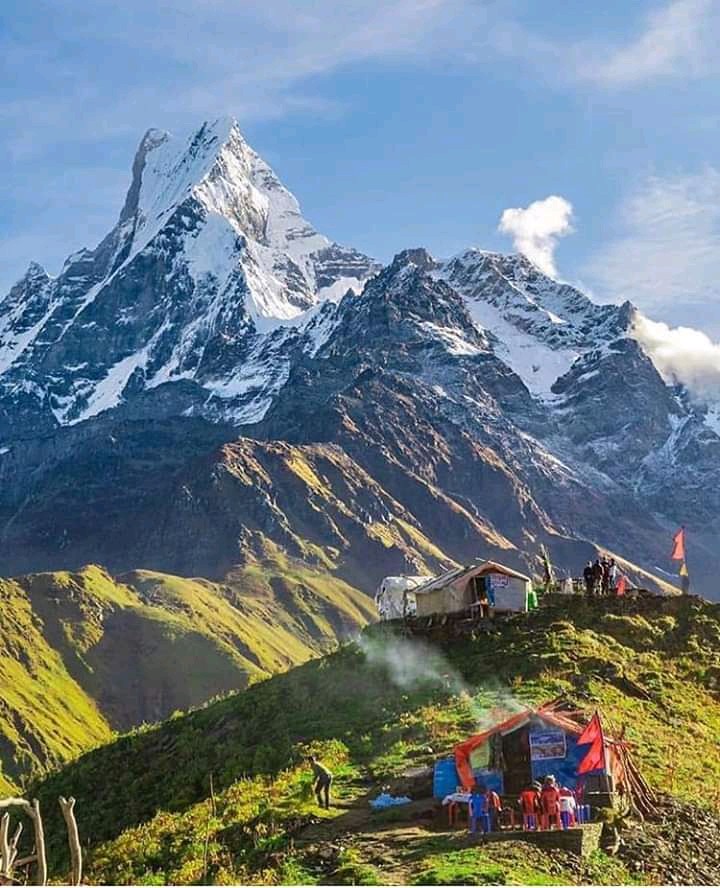 Mardi Himal trekking trail surrounded by lush green forests and misty mountain landscapes during the monsoon season in Nepal.