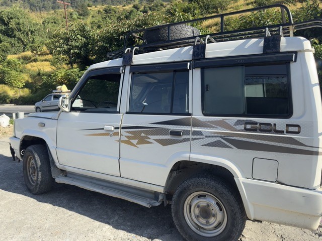 Jeep ride on mountain road near Siding village in Nepal along the Mardi Himal Trek route