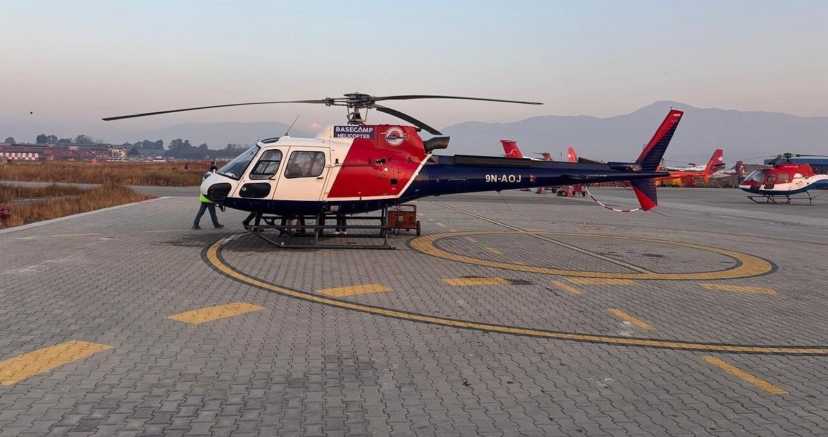 Helicopter being prepared on a helipad in the Himalayan region