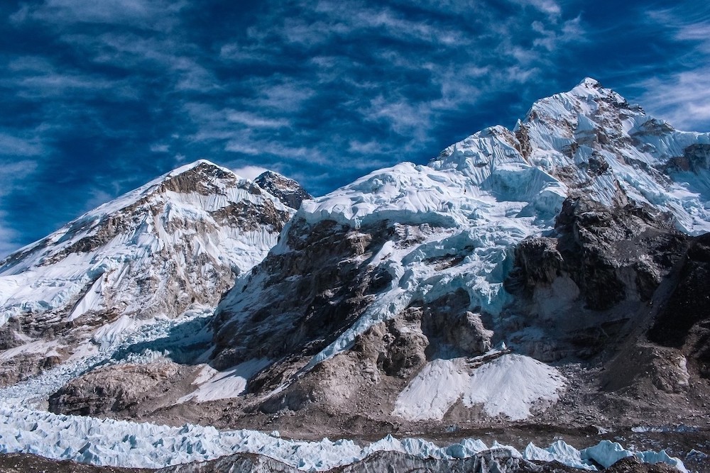 Snow-covered Mount Everest and surrounding Himalayan peaks on the Everest Base Camp Trek.