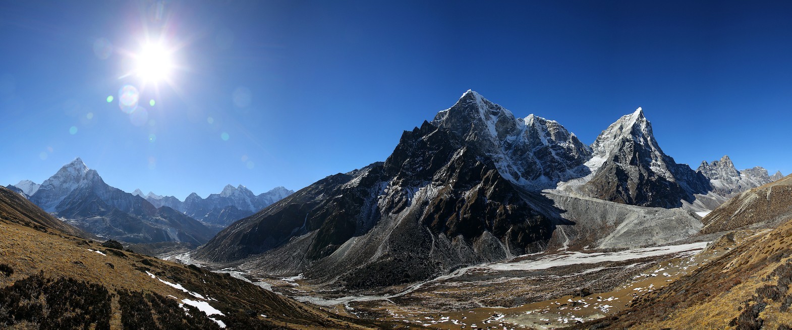"Nagarjun Hill above Dingboche with panoramic views of Mount Makalu, Lhotse, Ama Dablam, Island Peak, and the rugged Khumbu Valley during the Everest Base Camp Trek"