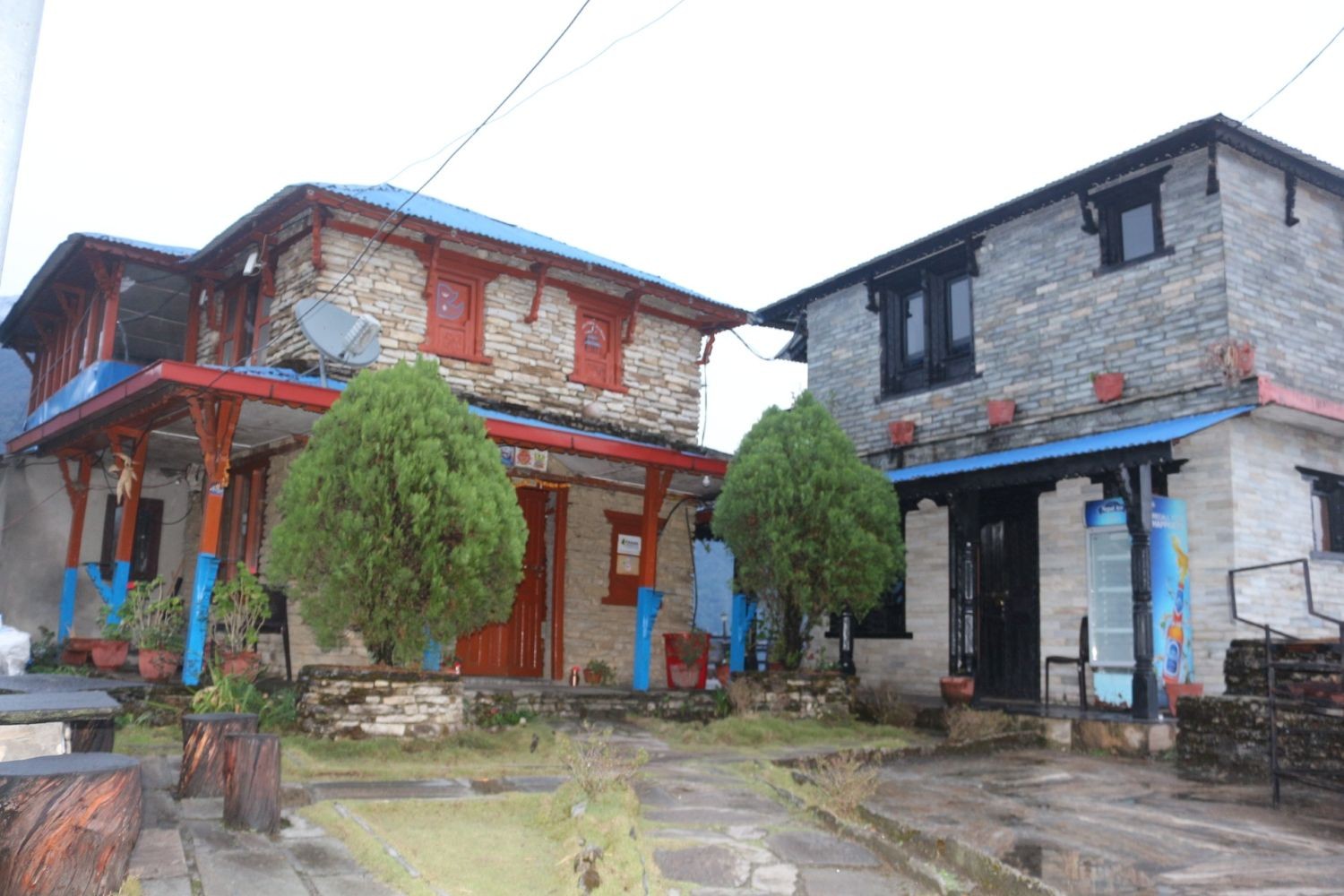 Alt Text: Traditional teahouse lodge in Siding Village on the Mardi Himal Trek in Nepal.