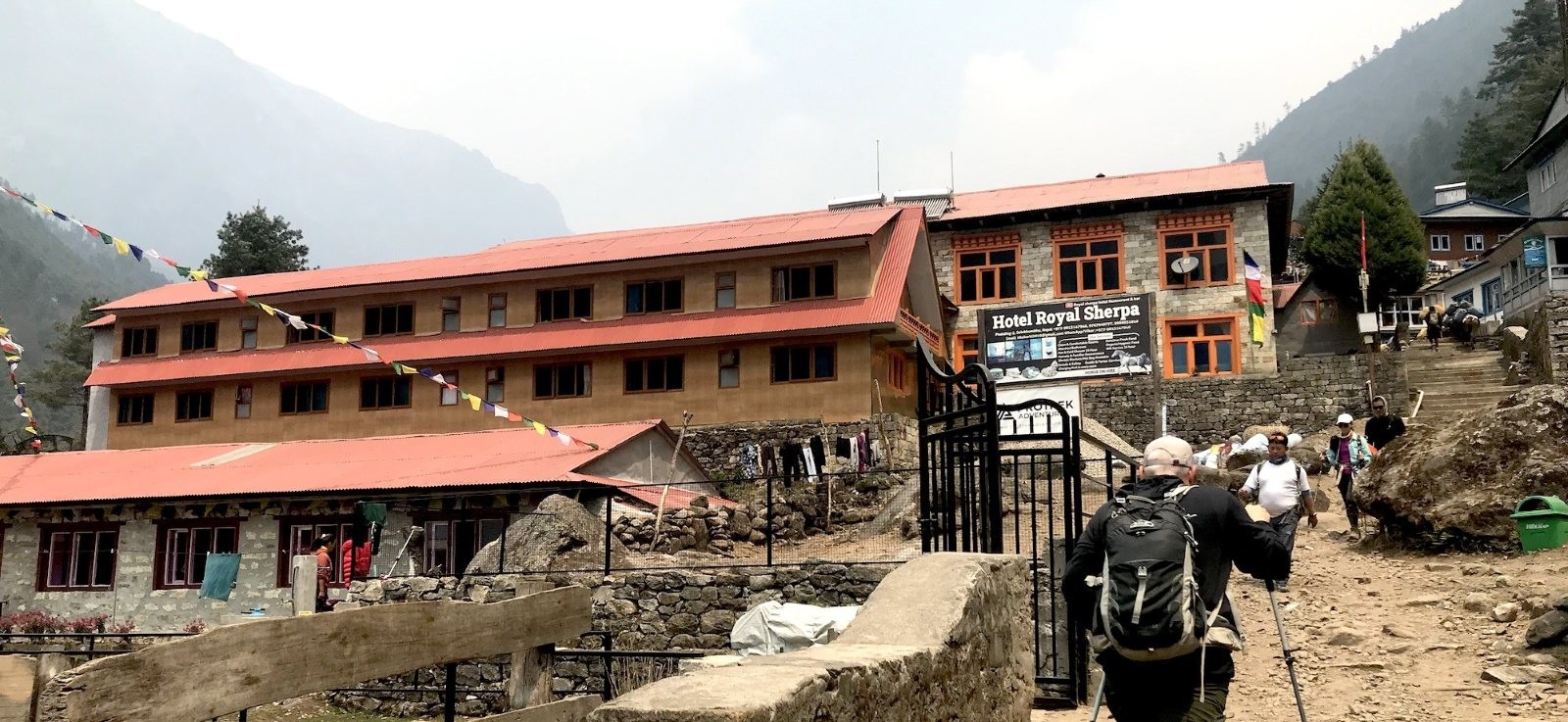 Mountain lodge in Phakding on the Everest Base Camp Trek with Himalayan scenery.