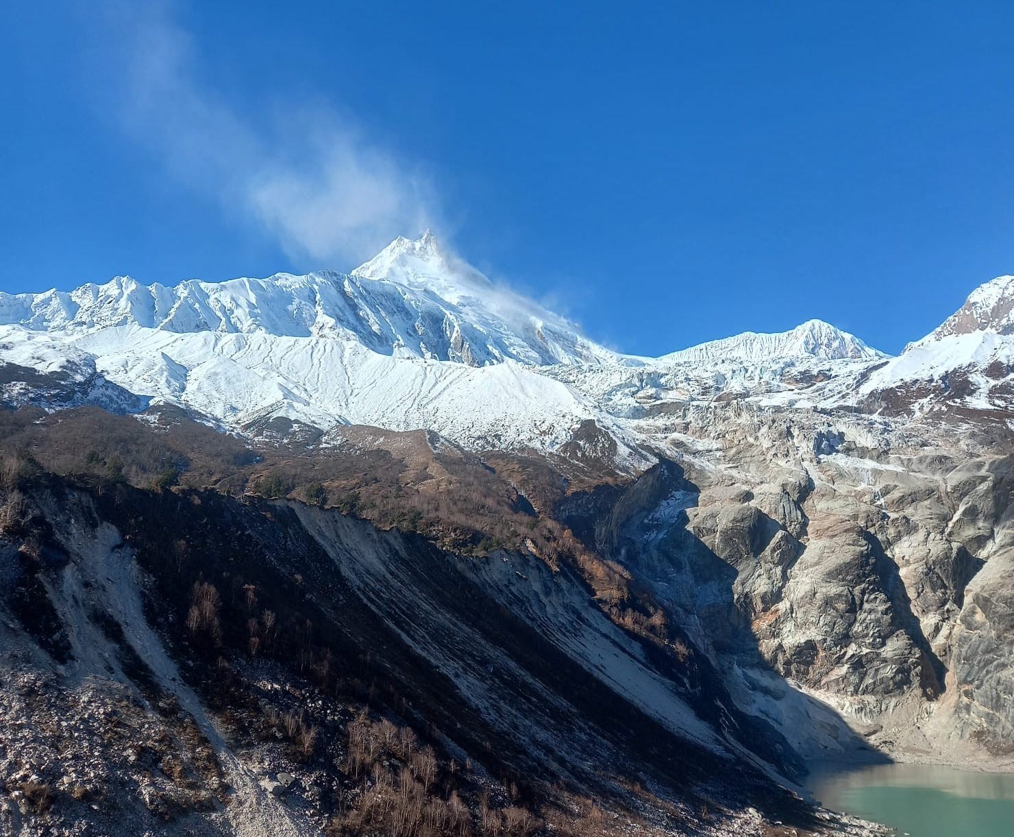 The stunning combination of Mount Manaslu and Birendra Lake creates one of the most iconic landscapes on the Manaslu Circuit Trek.