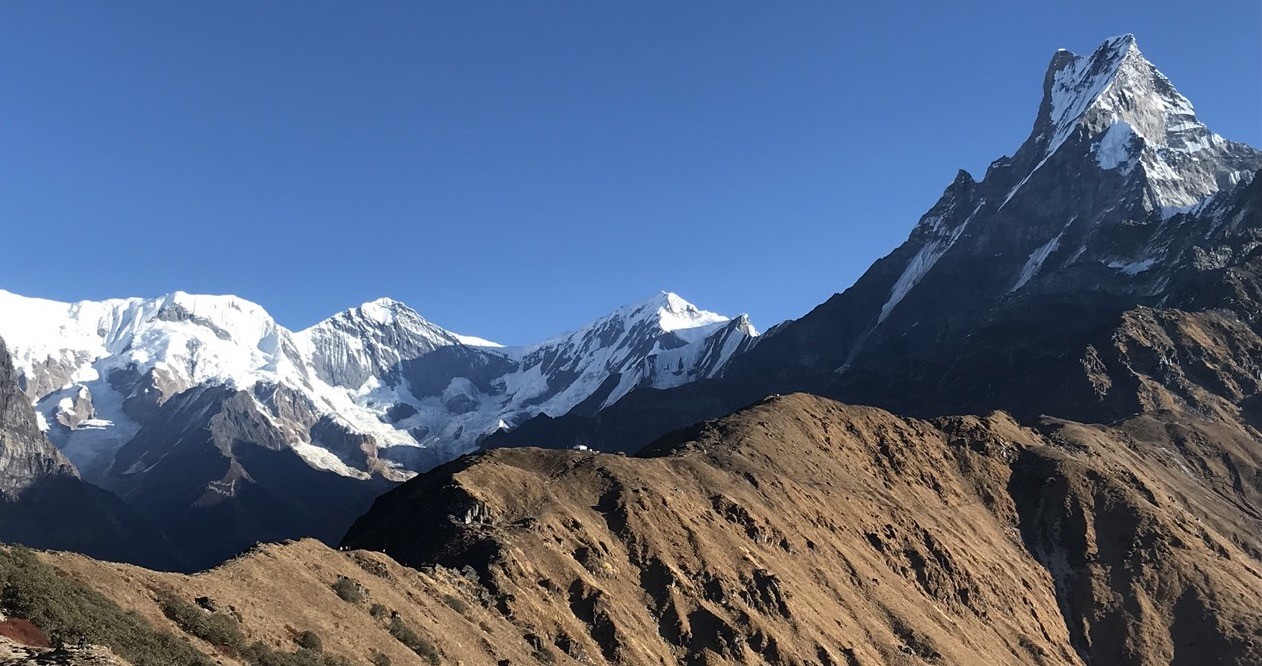 Mardi Himal Viewpoint with panoramic views of Machhapuchhre (Fishtail), Annapurna South, Hiunchuli, and the snow-capped Himalayan peaks near Pokhara, Nepal.